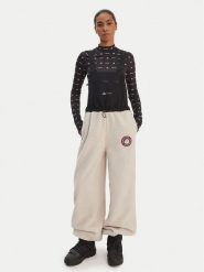 Adidas Ogrodniczki Moon Boot JM1106 Beżowy Loose Fit. Brązowe spodnie materiałowe damskie Adidas, bez wzorów, z materiału. Za 439.99 zł.