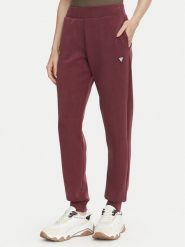 Guess Spodnie dresowe V4YB08 KCAY2 Bordowy Regular Fit. Czerwone spodnie dresowe damskie Guess, z aplikacjami, z dresówki. Za 344.99 zł.