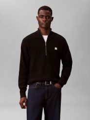 Calvin Klein Jeans sweter z dzianiny Mężczyźni Bawełna czarny, L. Czarne swetry męskie Calvin Klein Jeans, l, z aplikacjami, z bawełny, eleganckie, bez kołnierzyka, bez ramiączek. Za 279.95 zł.