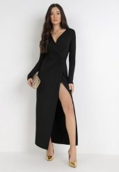 Czarna Sukienka Mellona. Czarne sukienki damskie Born2be, l, bez wzorów, z dzianiny, eleganckie, bez kołnierzyka, bez ramiączek, maxi, kopertowe. Za 129.99 zł.