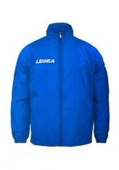 Kurtka Przeciwdeszczowa Legea Italia 0002 Dorosłych. Niebieskie kurtki sportowe męskie Legea, l, bez wzorów, z materiału, z kapturem. Za 56.00 zł.