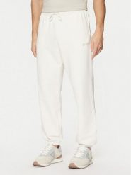 Guess Spodnie dresowe Z4YB00 KAIJ1 Écru Relaxed Fit. Spodnie sportowe męskie Guess, m, z aplikacjami, z bawełny. Za 179.99 zł.