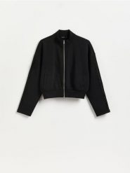 Bluza z ażurowymi wstawkami - czarny. Czarne bluzy damskie Reserved, l, w ażurowe wzory, z bawełny, bez ramiączek, bez kaptura. Za 99.99 zł.