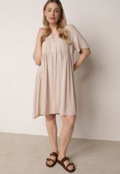 Beżowa Rozkloszowana Sukienka w Koszulowym Stylu z Bawełny Normae. Brązowe sukienki damskie Born2be, do pracy, l, bez wzorów, z bawełny, biznesowe, bez kołnierzyka, bez ramiączek, midi, koszulowe. Za 89.99 zł.
