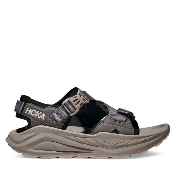 Sandały Hoka. Brązowe buty zimowe męskie HOKA, bez wzorów, bez obcasa, bez zapięcia. Za 599.99 zł.
