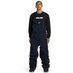 Spodnie snowboardowe męskie DC Shoes Brigade 45K kombinezon. Czarne spodnie sportowe męskie DC Shoes, m, bez wzorów, z poliesteru, narciarskie. Za 701.00 zł.