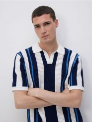 Ażurowy sweter polo - wielobarwny. Swetry męskie Reserved, l, w ażurowe wzory, z bawełny, bez kołnierzyka, bez ramiączek. Za 139.99 zł.