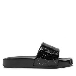 Klapki Tory Burch. Czarne klapki damskie Tory Burch, bez wzorów, bez obcasa, bez zapięcia. Za 499.99 zł.