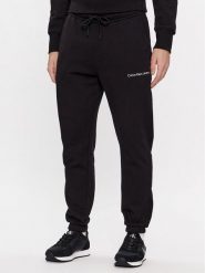 Calvin Klein Jeans Spodnie dresowe Institutional J30J324739 Czarny Regular Fit. Czarne spodnie sportowe męskie Calvin Klein Jeans, m, bez wzorów, z bawełny. Za 429.99 zł.