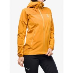 Kurtka softshell damska Haglofs Moran Softshell Hood. Żółte kurtki sportowe damskie Haglöfs, bez wzorów, z softshellu, bez ramiączek, bez kaptura, trekkingowe. Za 596.99 zł.