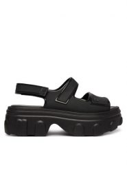 Melissa Sandały Melissa Ella Move Ad 36150 Czarny. Czarne sandały damskie Melissa, bez wzorów, z tworzywa sztucznego, bez obcasa, na koturnie, bez zapięcia. Za 578.99 zł.