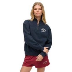Bluza damska Superdry Athletic Essential. Niebieskie bluzy damskie Superdry, bez wzorów, eleganckie, bez ramiączek, bez kaptura. Za 288.40 zł.