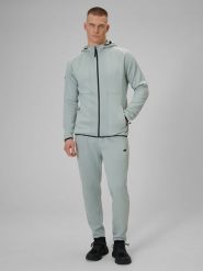 4F Spodnie treningowe szybkoschnące męskie - miętowe S. Niebieskie spodnie sportowe męskie 4F, l, bez wzorów, z materiału, na fitness i siłownię. Za 199.99 zł.