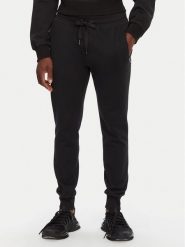 Dolce&Gabbana Spodnie dresowe GVXQHT G7F2G Czarny Regular Fit. Czarne spodnie sportowe męskie Dolce&Gabbana, m, bez wzorów, z bawełny. Za 2,289.00 zł.