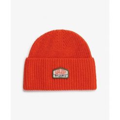 Czapka z dzianiny Superdry Trucker. Brązowe czapki męskie Superdry, na zimę, bez wzorów, z dzianiny. Za 126.95 zł.