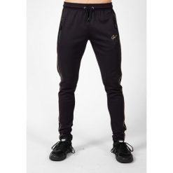 Wenden Track Spodnie - Czarny/Złoty. Żółte spodnie sportowe męskie GORILLA WEAR, xl, bez wzorów, z dresówki, na fitness i siłownię. Za 212.00 zł.