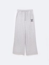 Spodnie damskie dresowe wide szare Madelinap 901. Szare spodnie dresowe damskie BIG STAR, z aplikacjami, z dresówki, eleganckie. Za 179.99 zł.