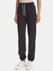 Guess Spodnie dresowe V5YB06 KBSL2 Czarny Regular Fit. Czarne spodnie dresowe damskie Guess, z aplikacjami, z dresówki. Za 259.99 zł.