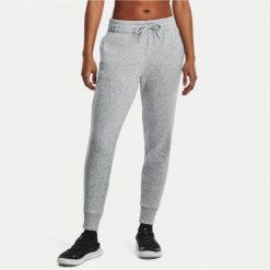 Spodnie dresowe damskie Under Armour Rival Fleece Jogger XL. Szare spodnie dresowe damskie Under Armour, bez wzorów, z dresówki, sportowe, na fitness i siłownię. Za 137.99 zł.