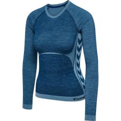 Damska dopasowana koszulka z długim rękawem bez szwów Hummel Clea. Niebieskie bluzki damskie Hummel, bez wzorów, sportowe, bez kołnierzyka, bez ramiączek. Za 266.50 zł.