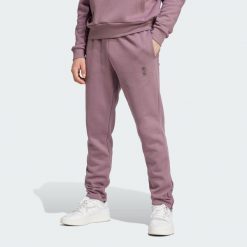 Spodnie Real Madrid Seasonal. Fioletowe spodnie sportowe męskie Adidas, l, bez wzorów, z dresówki, do piłki nożnej. Za 299.00 zł.