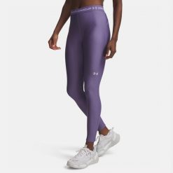 Legginsy treningowe damskie Under Armour HeatGear. Fioletowe legginsy damskie Under Armour, bez wzorów. Za 129.99 zł.