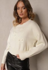 Jasnobeżowy Wiskozowy Sweter z Ozdobnym Tłoczeniem Harizelle. Brązowe swetry nierozpinane damskie Renee, bez wzorów, z wiskozy, biznesowe, bez kołnierzyka, bez ramiączek. Za 149.99 zł.