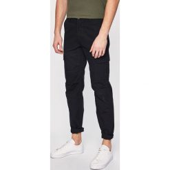 Dickies - Spodnie. Czarne spodnie materiałowe męskie Dickies, bez wzorów, z bawełny. W wyprzedaży za 179.90 zł.