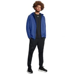 Męska kurtka dresowa Unstoppable (Niebieska). Niebieskie kurtki męskie Under Armour, m, bez wzorów, z bawełny, sportowe, z kapturem. Za 474.55 zł.