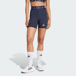 Krótkie legginsy TECHFIT. Niebieskie legginsy damskie Adidas, bez wzorów, z materiału. Za 129.00 zł.