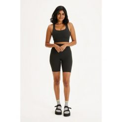 Biustonosz dla kobiet Girlfriend Collective Rib Paloma. Czarne bielizna sportowa damska GIRLFRIEND COLLECTIVE, xl, bez wzorów. Za 272.50 zł.