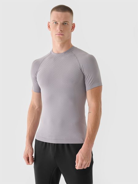 4F Koszulka treningowa bezszwowa szybkoschnąca męska 4F x Robert Lewandowski - szara L/XL. Szare koszulki sportowe męskie 4F, l, bez wzorów, z dzianiny, bez ramiączek, na fitness i siłownię. W wyprzedaży za 79.99 zł.