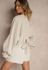 Beżowa Bawełniana Bluzka Typu Nietoperz z Wiązaniem Sepionna. Brązowe bluzki damskie Renee, bez wzorów, z bawełny, eleganckie, bez kołnierzyka, bez ramiączek. Za 89.99 zł.