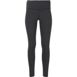 Legginsy modelujące dla kobiet Athlecia Stay. Czarne legginsy damskie Athlecia, bez wzorów. Za 228.50 zł.