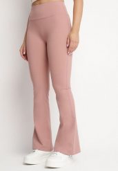 Różowe Legginsy o Kroju Dzwonów z Wysokim Stanem Koritea. Czerwone legginsy damskie Born2be, bez wzorów, z jeansu. Za 39.99 zł.