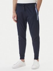 BOSS Spodnie dresowe Authentic 50554784 Granatowy Regular Fit. Niebieskie spodnie sportowe męskie Boss, m, bez wzorów, z bawełny. Za 379.99 zł.