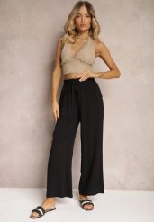 Czarne Spodnie Palazzo High Waist z Bawełny Wykończone Gumką w Talii Nellsea. Czarne spodnie materiałowe damskie Renee, bez wzorów, z bawełny, eleganckie, z podwyższonym stanem. Za 39.99 zł.