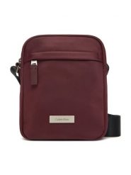 Calvin Klein Saszetka Sleek Reporter LV04D3180G Bordowy. Czerwone saszetki i nerki męskie Calvin Klein, z materiału. Za 299.99 zł.