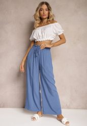 Niebieskie Spodnie Palazzo High Waist z Bawełny Wykończone Gumką w Talii Nellsea. Niebieskie spodnie materiałowe damskie Renee, bez wzorów, z bawełny, eleganckie, z podwyższonym stanem. Za 39.99 zł.
