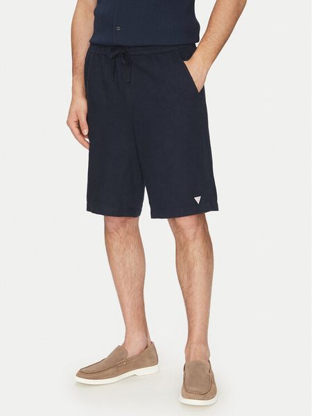 Guess Szorty materiałowe F5GD00 WH4J0 Granatowy Regular Fit. Niebieskie szorty męskie Guess, z aplikacjami, z bawełny. Za 179.99 zł.