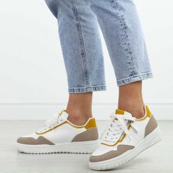 Beżowe sportowe buty damskie McBraun 23233. Brązowe obuwie sportowe damskie McBraun, na lato, bez wzorów, ze skóry, bez zapięcia, na fitness i siłownię. Za 99.00 zł.