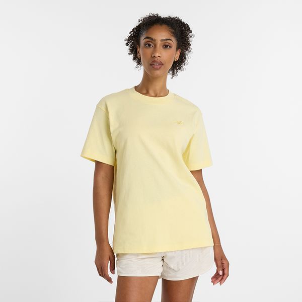 Koszulka damska New Balance WT41501PRC – żółta. Żółte bluzki damskie New Balance, s, bez wzorów, z materiału, eleganckie, bez kołnierzyka, bez ramiączek. Za 99.99 zł.