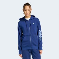 Bluza z kapturem damska ADIDAS fitness. Niebieskie bluzy damskie Adidas, xl, bez wzorów, z materiału, sportowe, bez ramiączek, z kapturem. Za 199.99 zł.