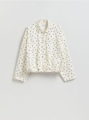 Koszula w groszki - złamana biel. Koszule damskie Reserved, l, bez wzorów, z bawełny, bez kołnierzyka, bez ramiączek. Za 149.99 zł.