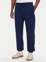 Tommy Hilfiger Spodnie dresowe Essential UM0UM03911 Granatowy Relaxed Fit. Niebieskie spodnie sportowe męskie Tommy Hilfiger, m, bez wzorów, z bawełny. Za 289.99 zł.