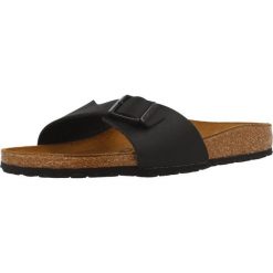 Klapki damskie Birkenstock Madrid BS. Czarne klapki damskie Birkenstock, bez wzorów, z materiału, bez obcasa, bez zapięcia. Za 462.00 zł.