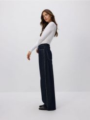 Jeansy wide leg z aplikacjami - granatowy. Niebieskie jeansy damskie Reserved, z aplikacjami, z bawełny. Za 159.99 zł.