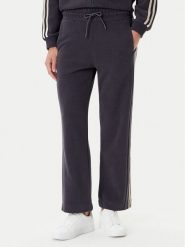EA7 Emporio Armani Spodnie dresowe 7W000568 AF15528 U8117 Szary Relaxed Fit. Szare spodnie dresowe damskie EA7 Emporio Armani, bez wzorów, z dresówki. Za 449.99 zł.