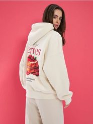 Bluza hoodie z nadrukiem - kremowy. Białe bluzy damskie Sinsay, l, bez wzorów, bez ramiączek, bez kaptura. Za 49.99 zł.
