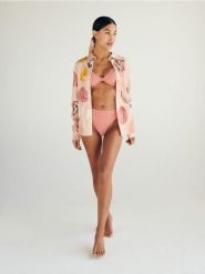 Góra od bikini z ochroną UV - brzoskwiniowy. Pomarańczowe stroje kąpielowe damskie Reserved, l, bez wzorów. W wyprzedaży za 39.99 zł.